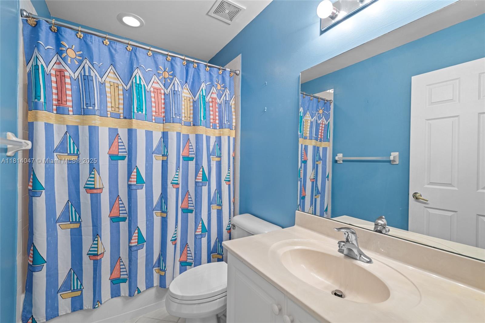 16316 Southwest 48th Street Miramar, FL 33027 - Photo 26 of 37 a bathroom with a sink and a toilet