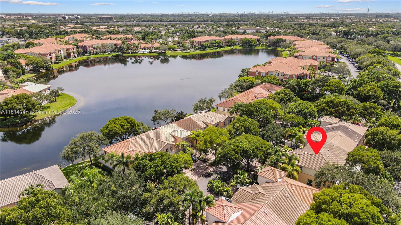 16316 Southwest 48th Street Miramar, FL 33027 - Photo 33 of 37 an aerial view of city and lake with residential houses with outdoor space
