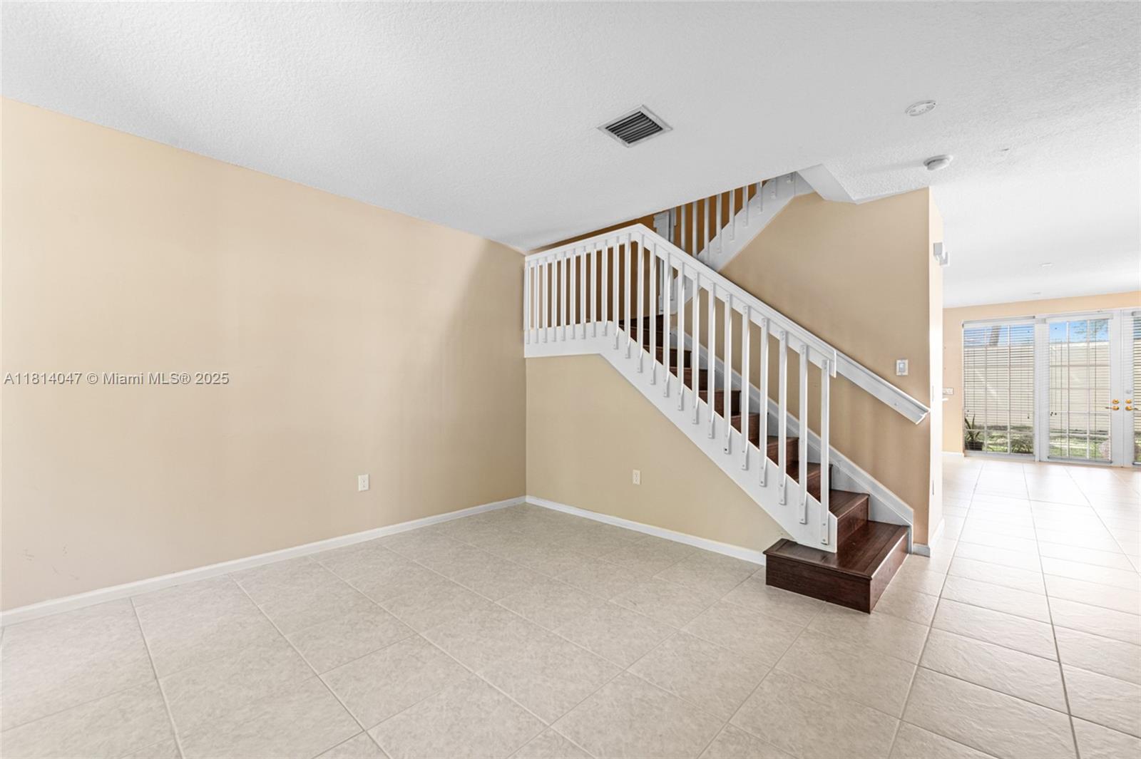16316 Southwest 48th Street Miramar, FL 33027 - Photo 7 of 37 a view of an entryway with staircase