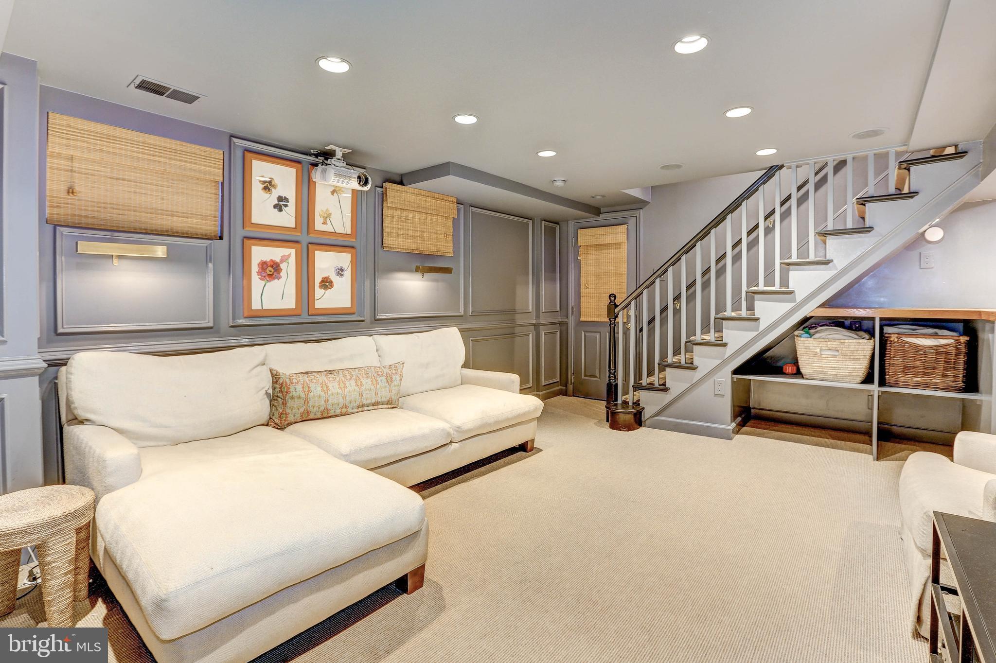 6001 Gloster Road Bethesda, MD 20816 - Photo 46 of 64 Lower level recreation room access to garage.