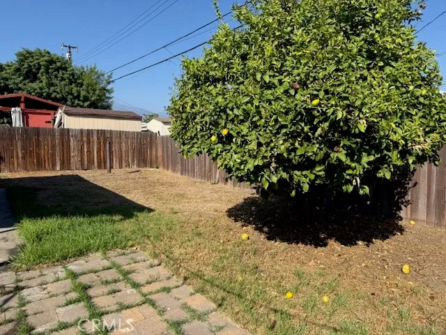 a view of a backyard of a house