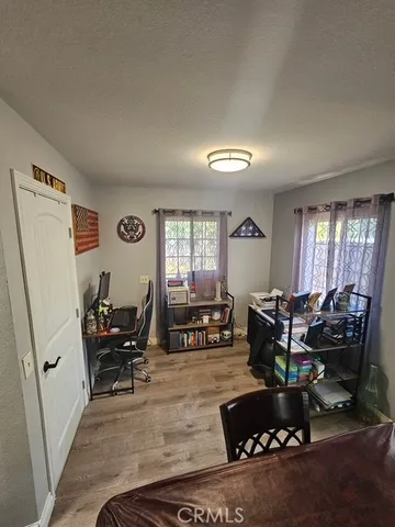 a living room with furniture window and a table