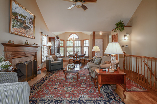 2570 Miller Road Geneva, IL 60134 - Photo 2 of 21 a living room with furniture and a fireplace