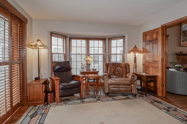 2570 Miller Road Geneva, IL 60134 - Photo 11 of 21 a living room with furniture a large window and flat screen tv
