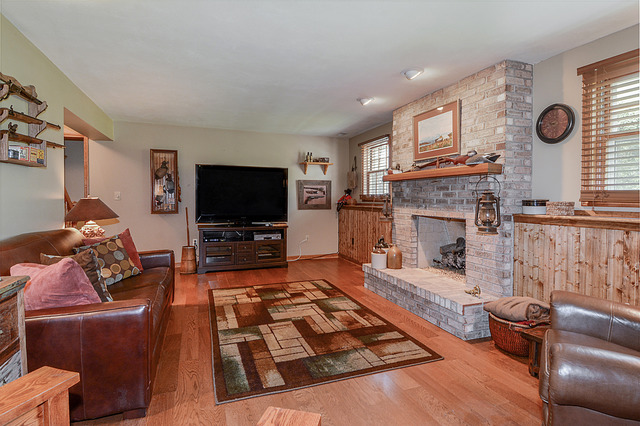 2570 Miller Road Geneva, IL 60134 - Photo 18 of 21 a living room with furniture and a flat screen tv