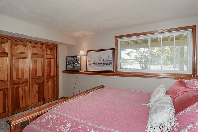 2570 Miller Road Geneva, IL 60134 - Photo 19 of 21 a bedroom with a bed and a window
