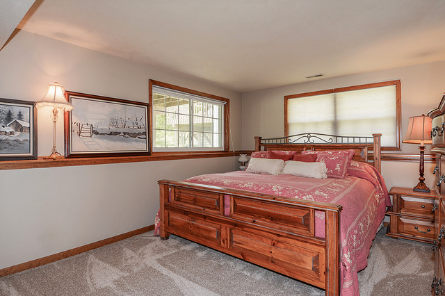 2570 Miller Road Geneva, IL 60134 - Photo 20 of 21 a bedroom with a bed and window