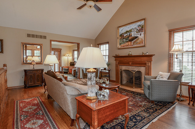 2570 Miller Road Geneva, IL 60134 - Photo 3 of 21 a living room with furniture a fireplace and a window