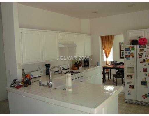 265 Camelback Ridge Avenue Henderson, NV 89012 - Photo 4 of 12 Kitchen. LOTS OF COUNTER SPACE IN THE KITCHEN AND ALL APPLIANCES STAY!! KITCHEN INCLUDES EAT IN NOOK AREA.