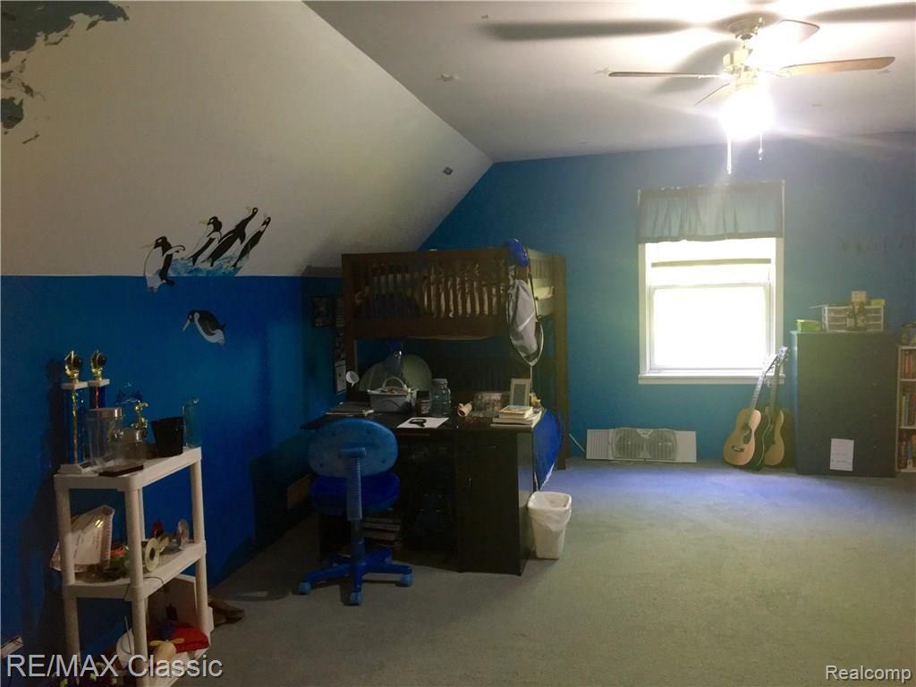 59468 Travis Road New Hudson, MI 48165 - Photo 12 of 13 Two extremely spacious upper level bedrooms plus a shared full bath