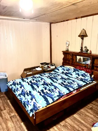 a bedroom with a bed