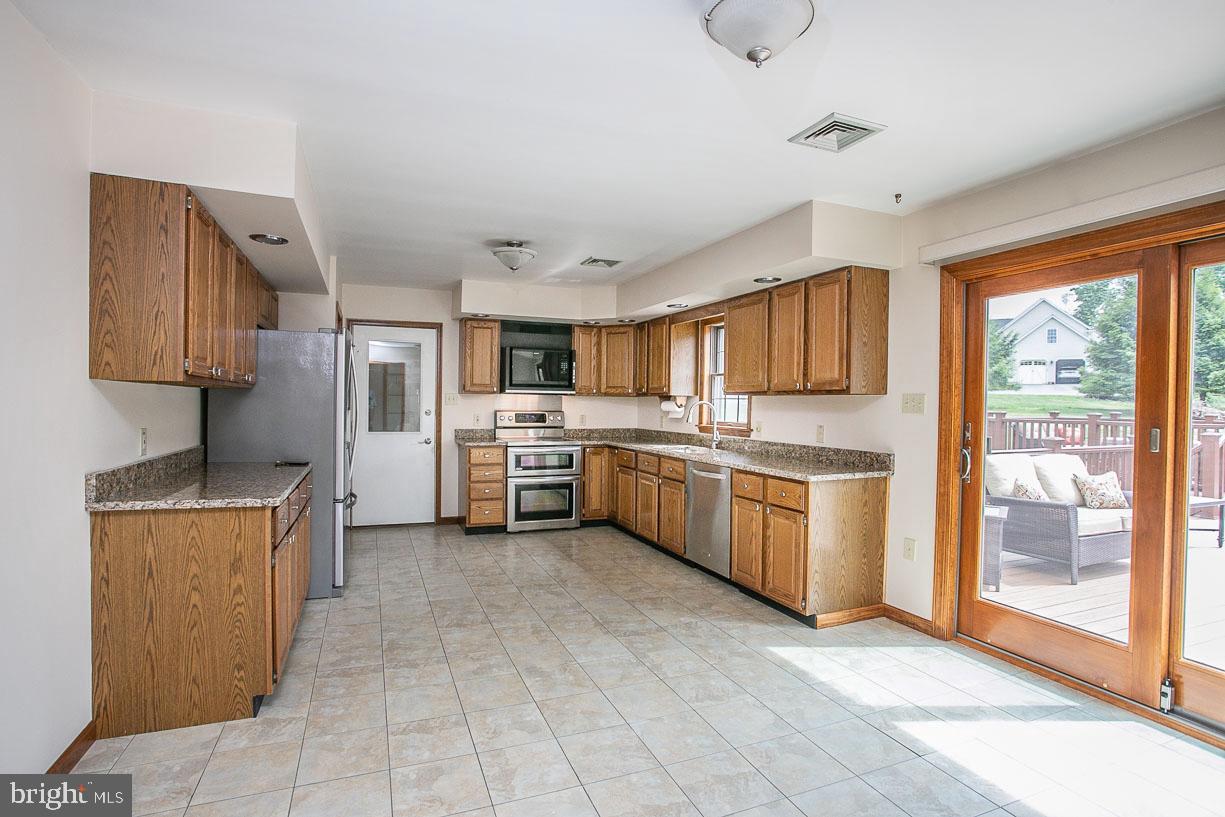 2525 Sumneytown Road Harleysville, PA 19438 - Photo 12 of 27 Kitchen with atrium doors to deck