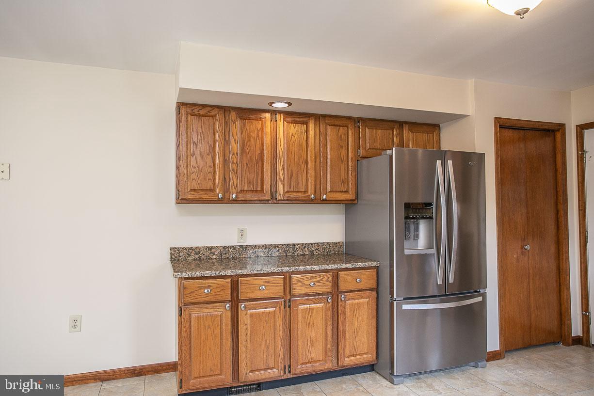 2525 Sumneytown Road Harleysville, PA 19438 - Photo 14 of 27 Kitchen with SS refrigerator and pantry