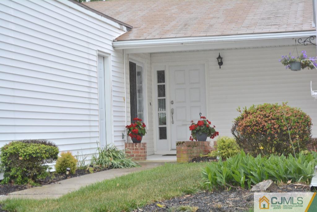 39 B Haddon Road Monroe Township, NJ 08831 - Photo 1 of 22 a front view of a house with a yard