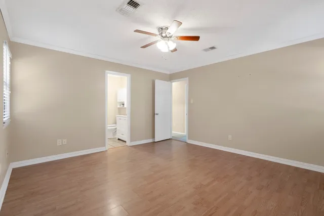 a view of an empty walk in closet