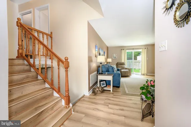 a view of staircase with furniture