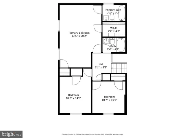 a picture of a bench in front of a wall