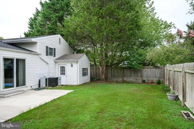 a view of a back yard of the house