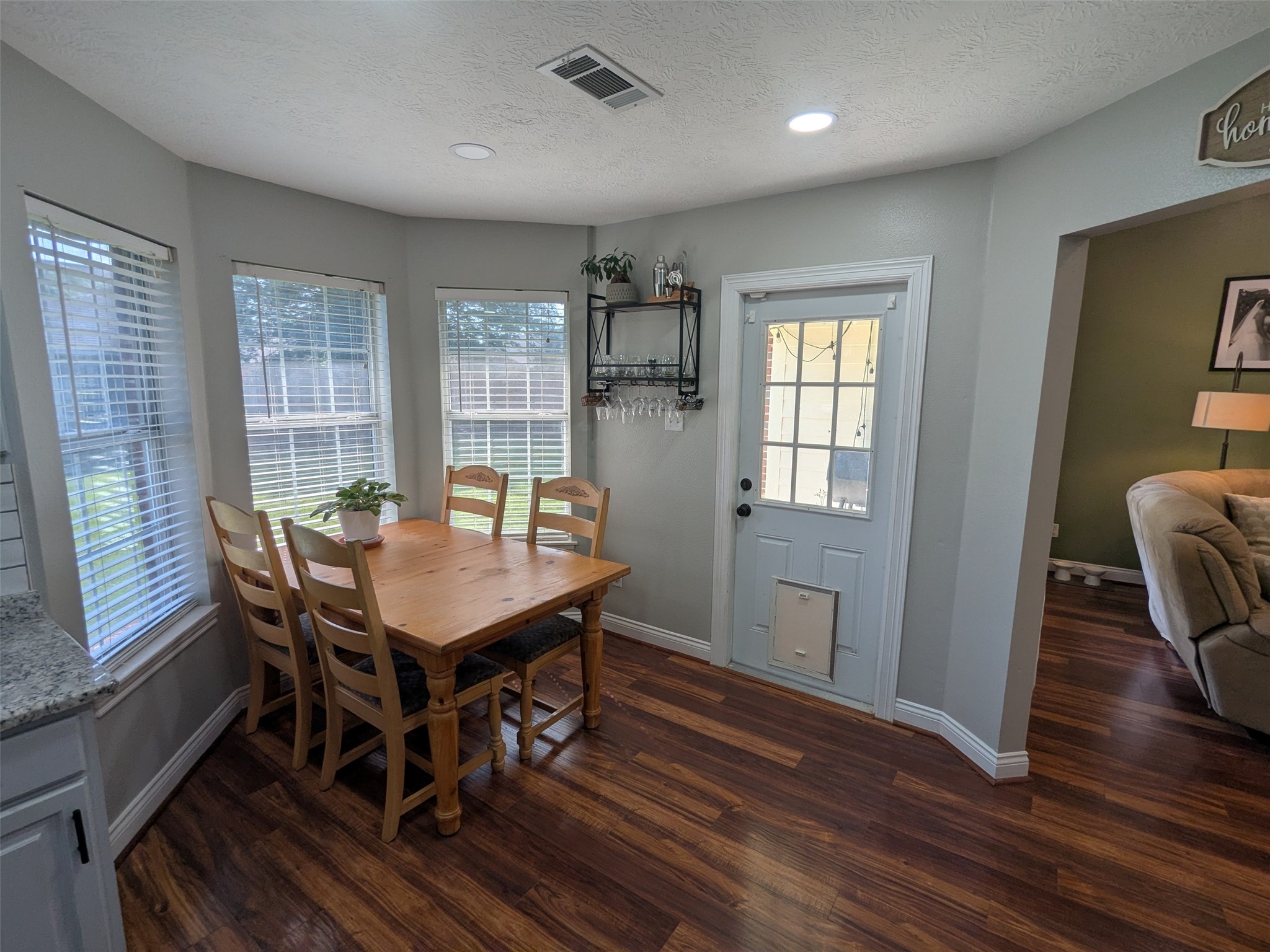 1035 North Colbert Street Dayton, TX 77535 - Photo 6 of 17 Kitchen/Dining with large windows.