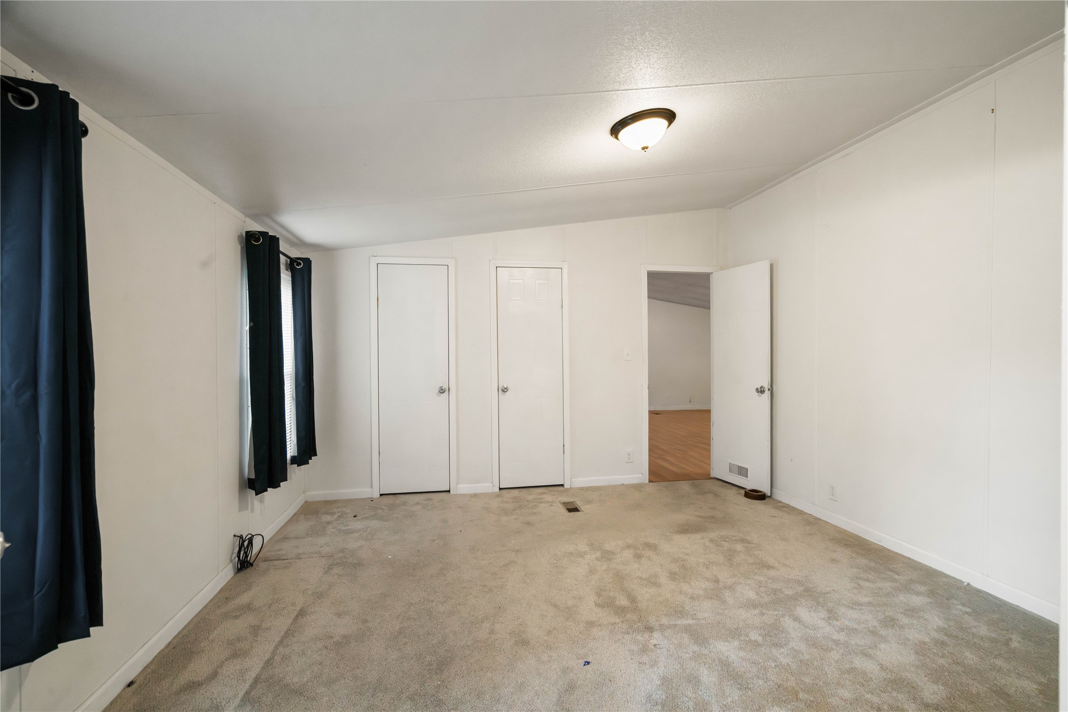 191 Aquarius Road Conroe, TX 77306 - Photo 19 of 32 Primary bedroom without staging