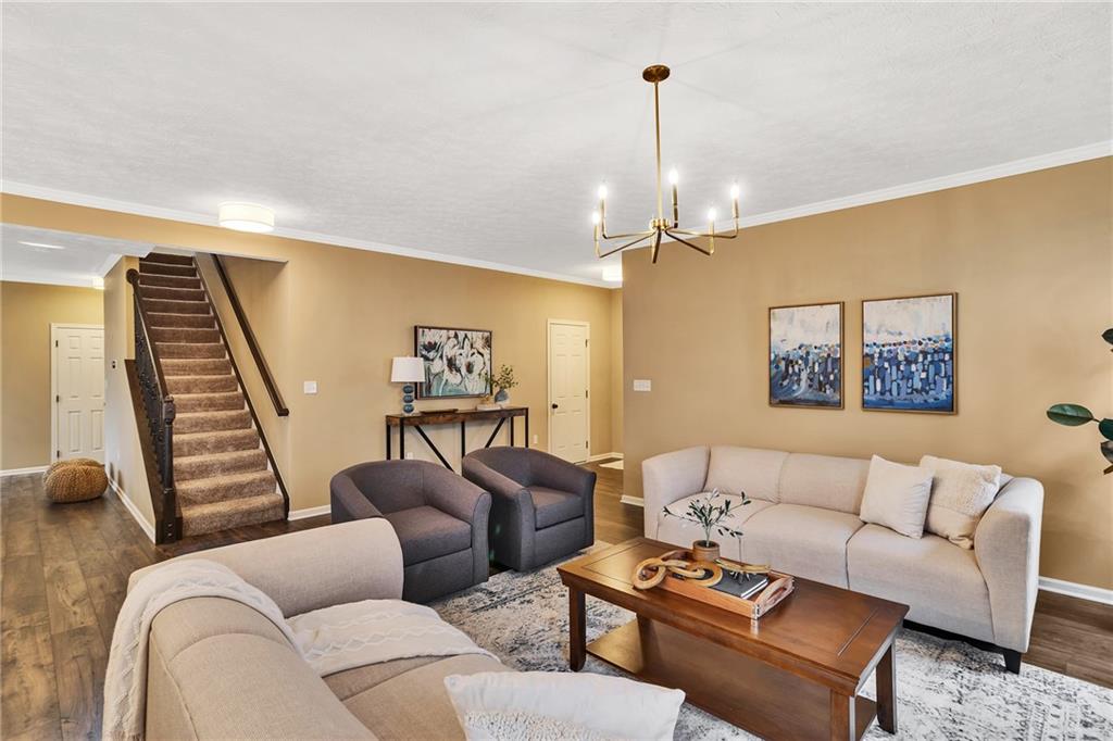201 Millstream Lane Zelienople, PA 16063 - Photo 20 of 48 a living room with furniture and a wooden floor