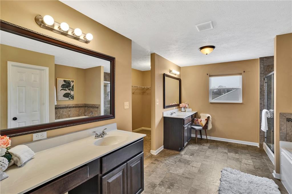201 Millstream Lane Zelienople, PA 16063 - Photo 23 of 48 a bathroom with a sink and a mirror