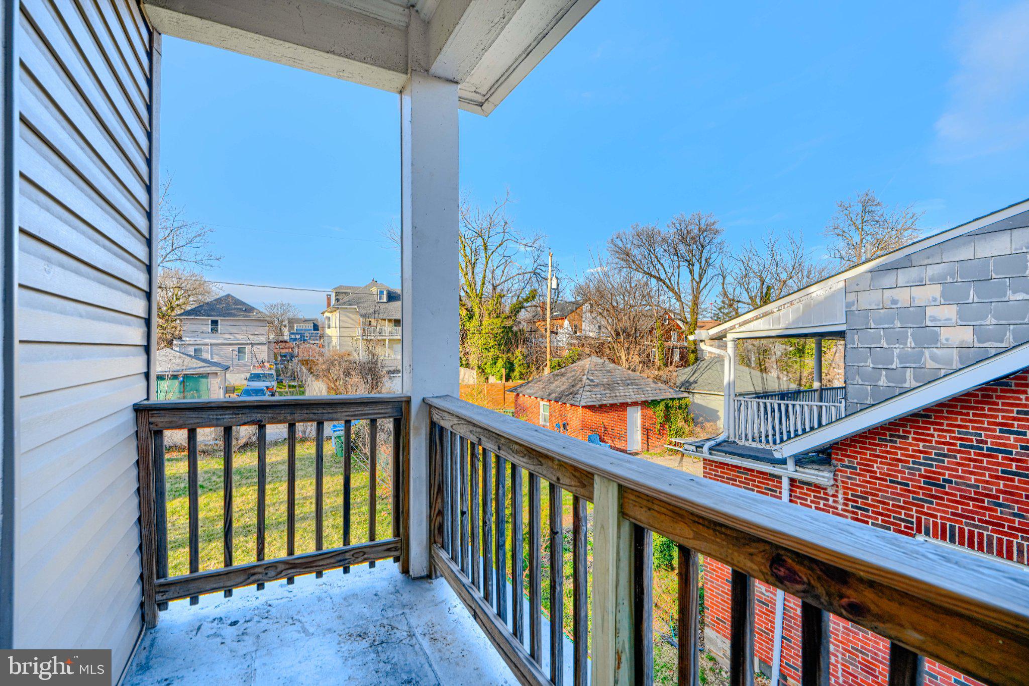 3414 Alto Road, Unit 2 Baltimore, MD 21216 - Photo 23 of 26 Charming balcony with serene views.