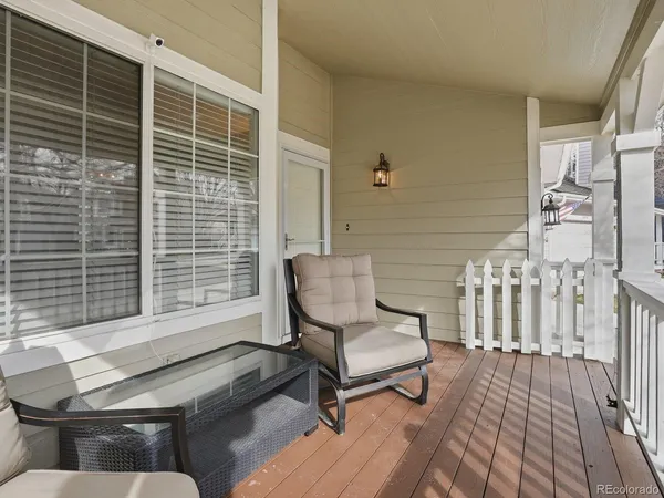 a view of porch with a bench