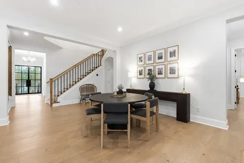 a bedroom with furniture and a fireplace