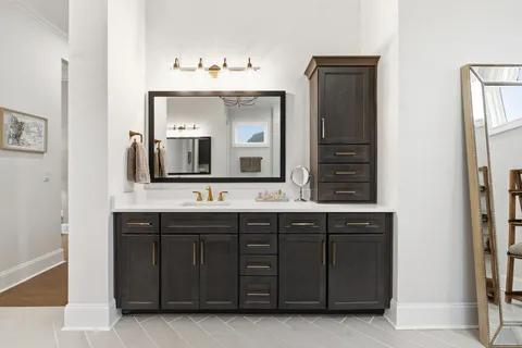 a bathroom with a toilet sink a shower and