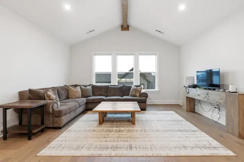 a bedroom with a bed and closet