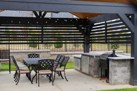 a aerial view of a house with a backyard