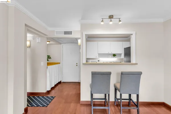 a living room with a sink and a window