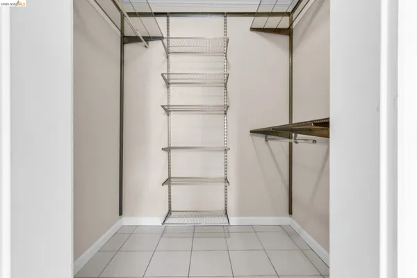 a bathroom with a sink vanity mirror and toilet