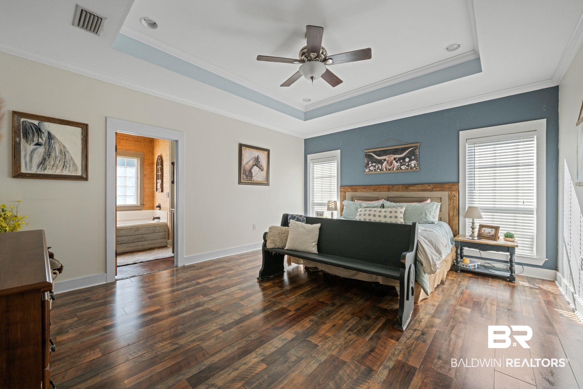 15635 North A N Brady Road Bay Minette, AL 36507 - Photo 22 of 51 Bedroom featuring multiple windows, dark wood-type flooring, ceiling fan, and ensuite bath