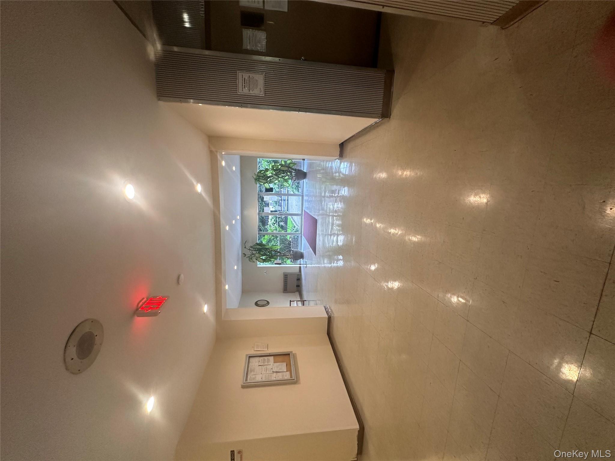 250 West Merrick Road, Unit 2F Freeport, NY 11520 - Photo 22 of 30 a view of a hallway