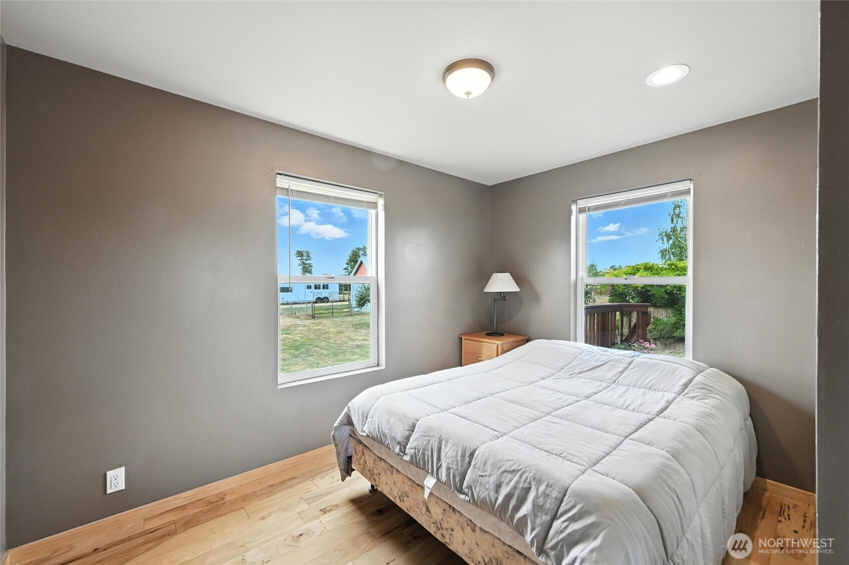 5149 Elder Road Ferndale, WA 98248 - Photo 13 of 40 a bedroom with a bed and a window