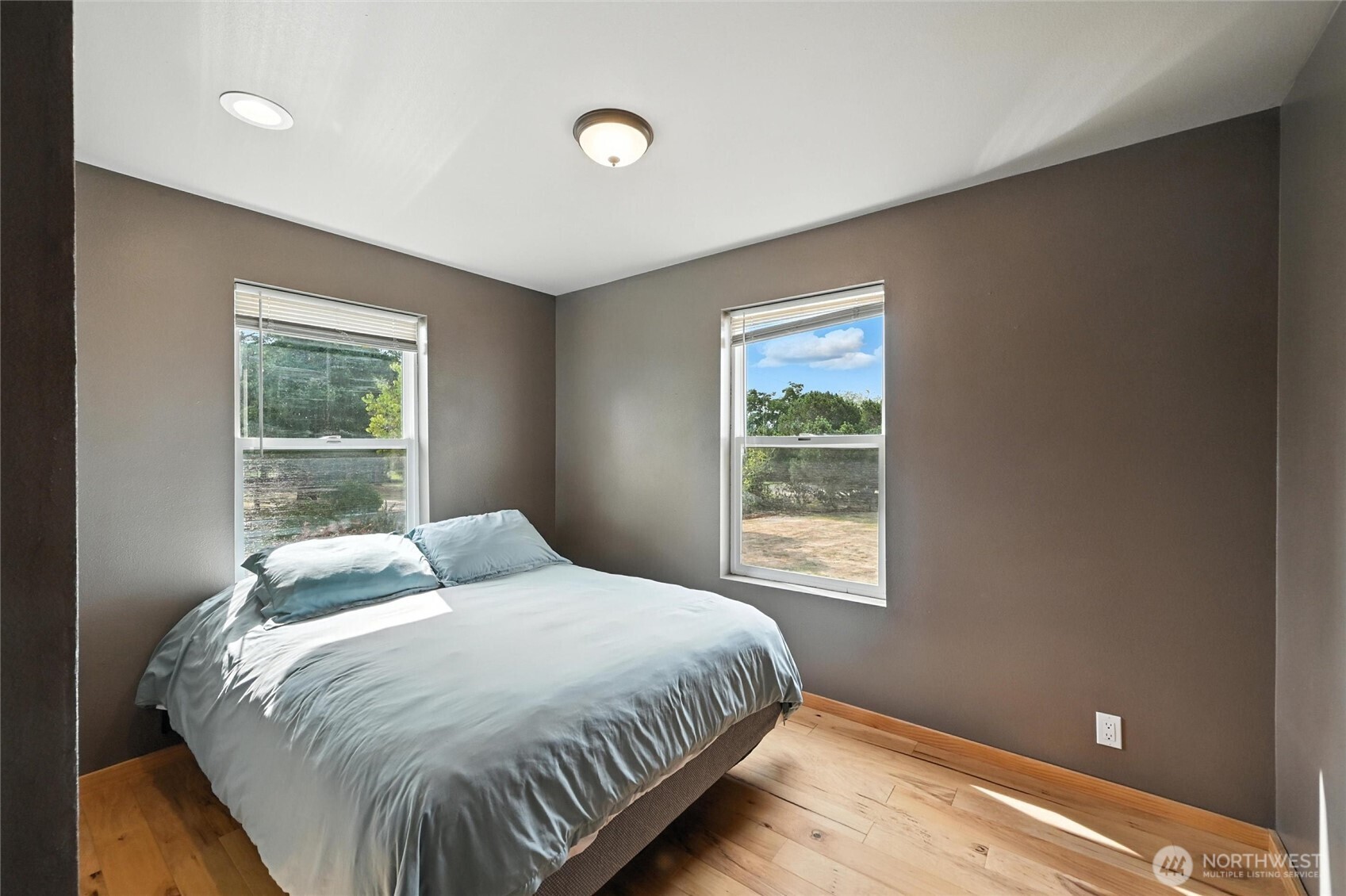 5149 Elder Road Ferndale, WA 98248 - Photo 14 of 40 a bedroom with a bed and a window