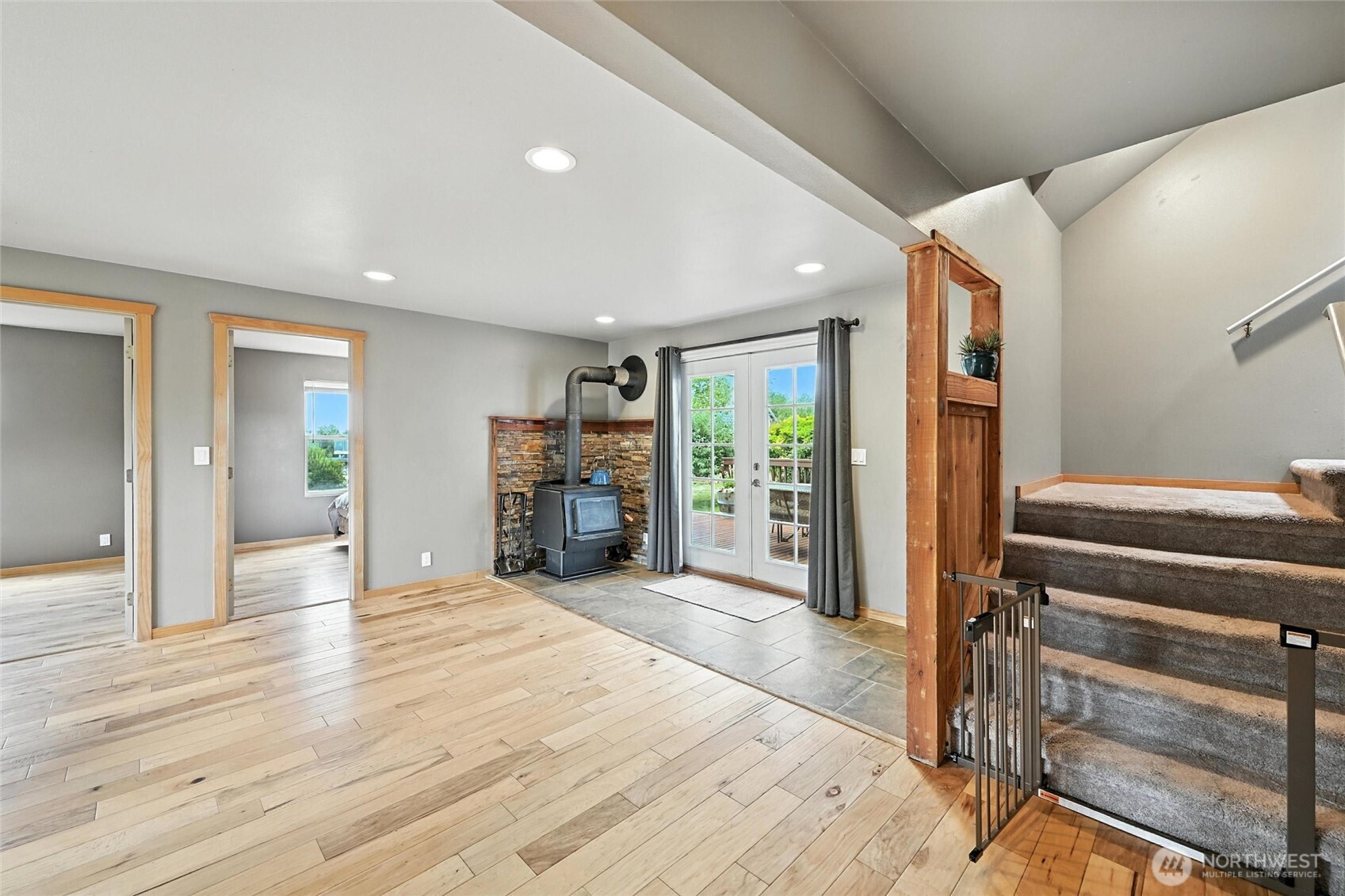 5149 Elder Road Ferndale, WA 98248 - Photo 16 of 40 a view of a livingroom with furniture and a ceiling fan
