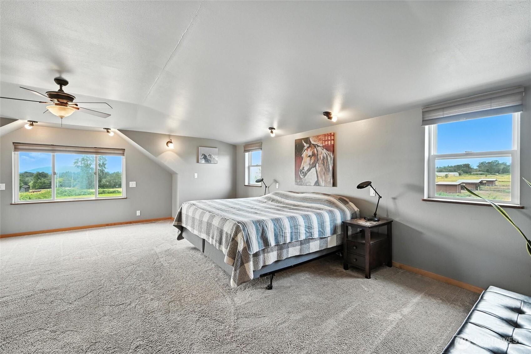 5149 Elder Road Ferndale, WA 98248 - Photo 17 of 40 a spacious bedroom with a bed and a window