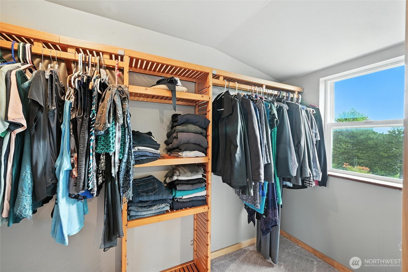 5149 Elder Road Ferndale, WA 98248 - Photo 19 of 40 a view of walk in closet with clothes and shoes