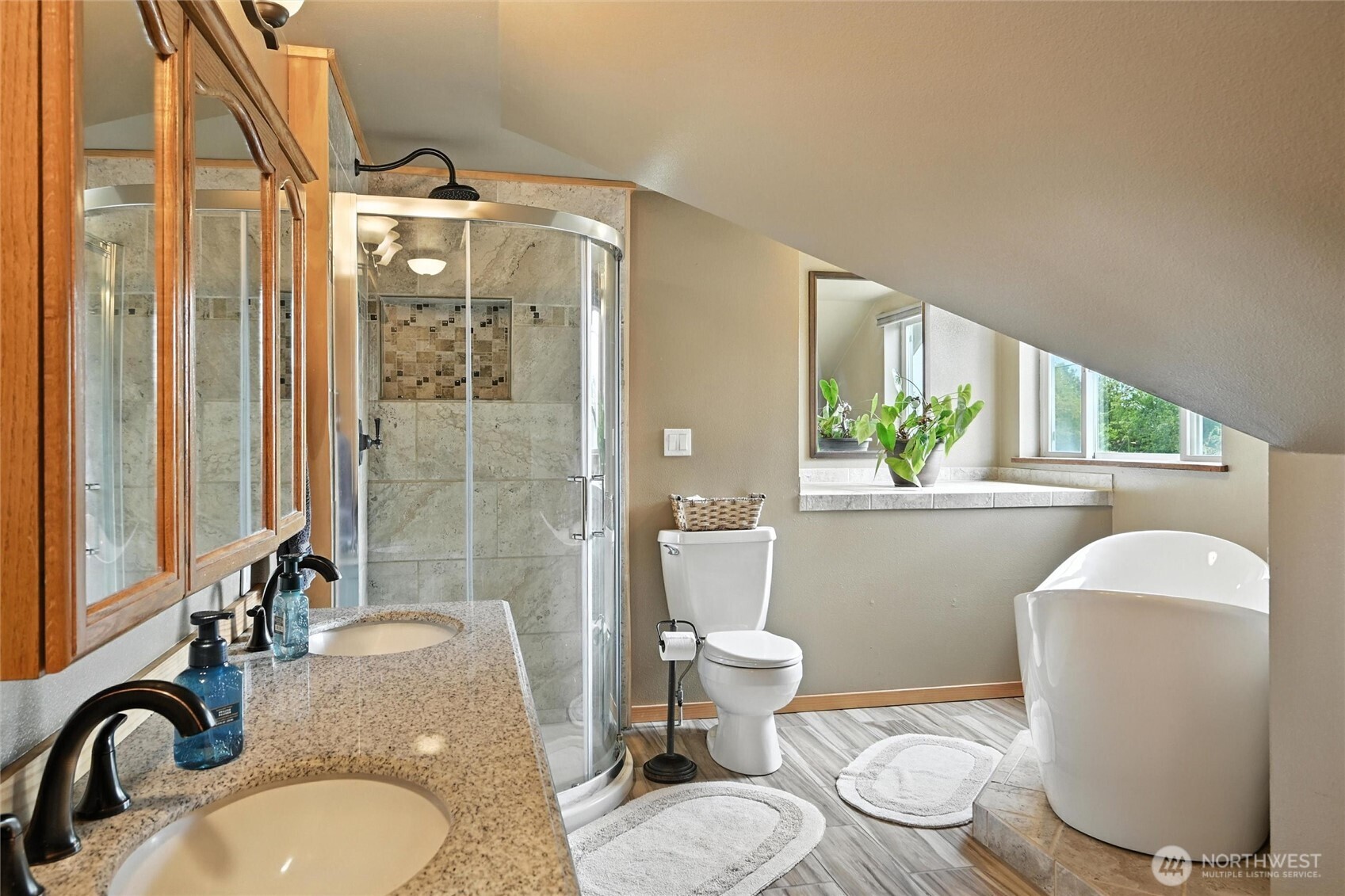 5149 Elder Road Ferndale, WA 98248 - Photo 20 of 40 a bathroom with a granite countertop sink mirror vanity and toilet