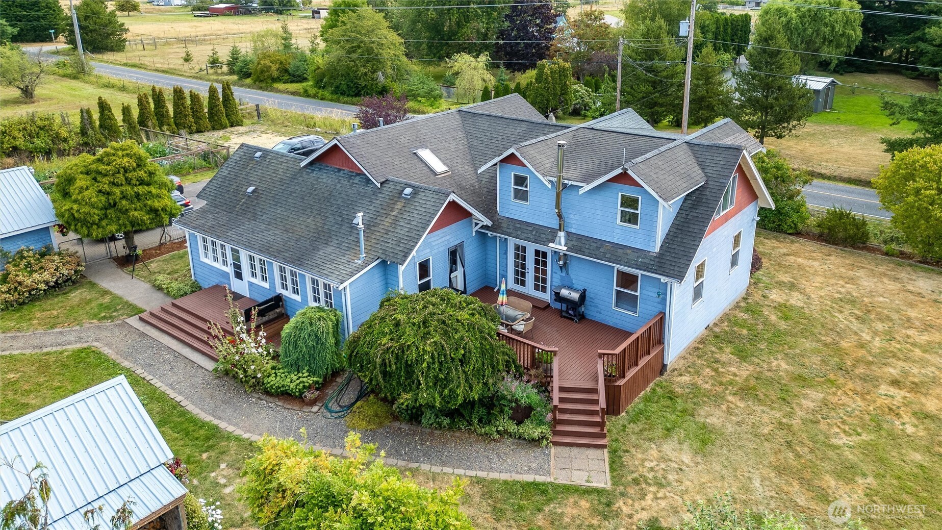 5149 Elder Road Ferndale, WA 98248 - Photo 3 of 40 an aerial view of a house with a garden