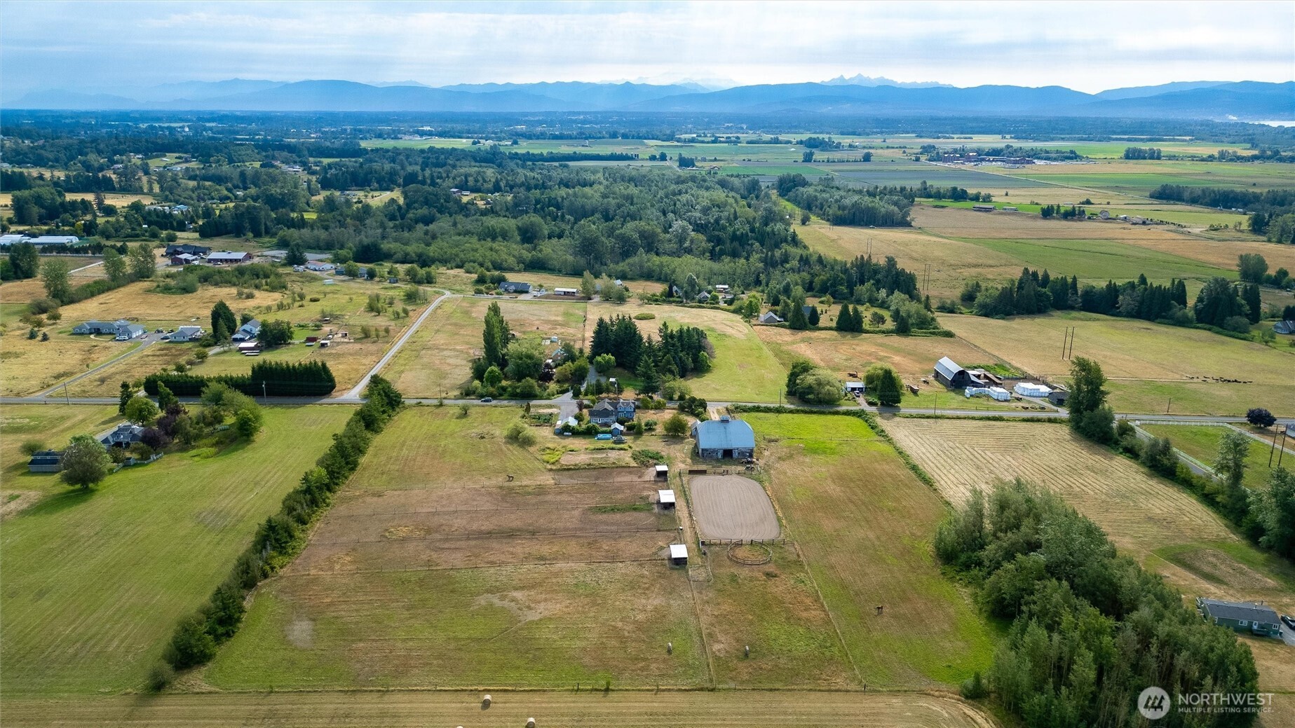 5149 Elder Road Ferndale, WA 98248 - Photo 38 of 40 a view of a lake with a yard
