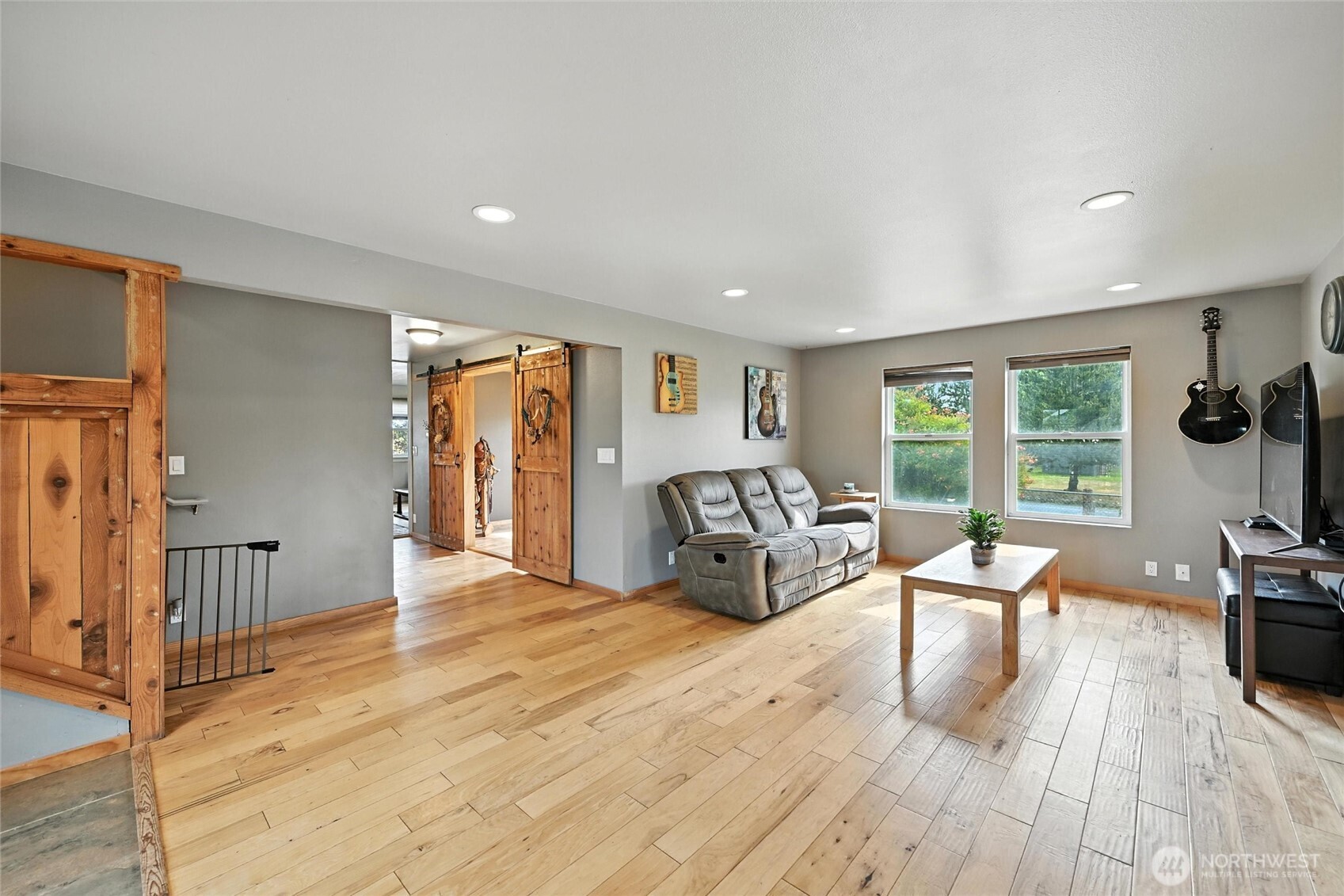 5149 Elder Road Ferndale, WA 98248 - Photo 10 of 40 a living room with furniture large window and wooden floor