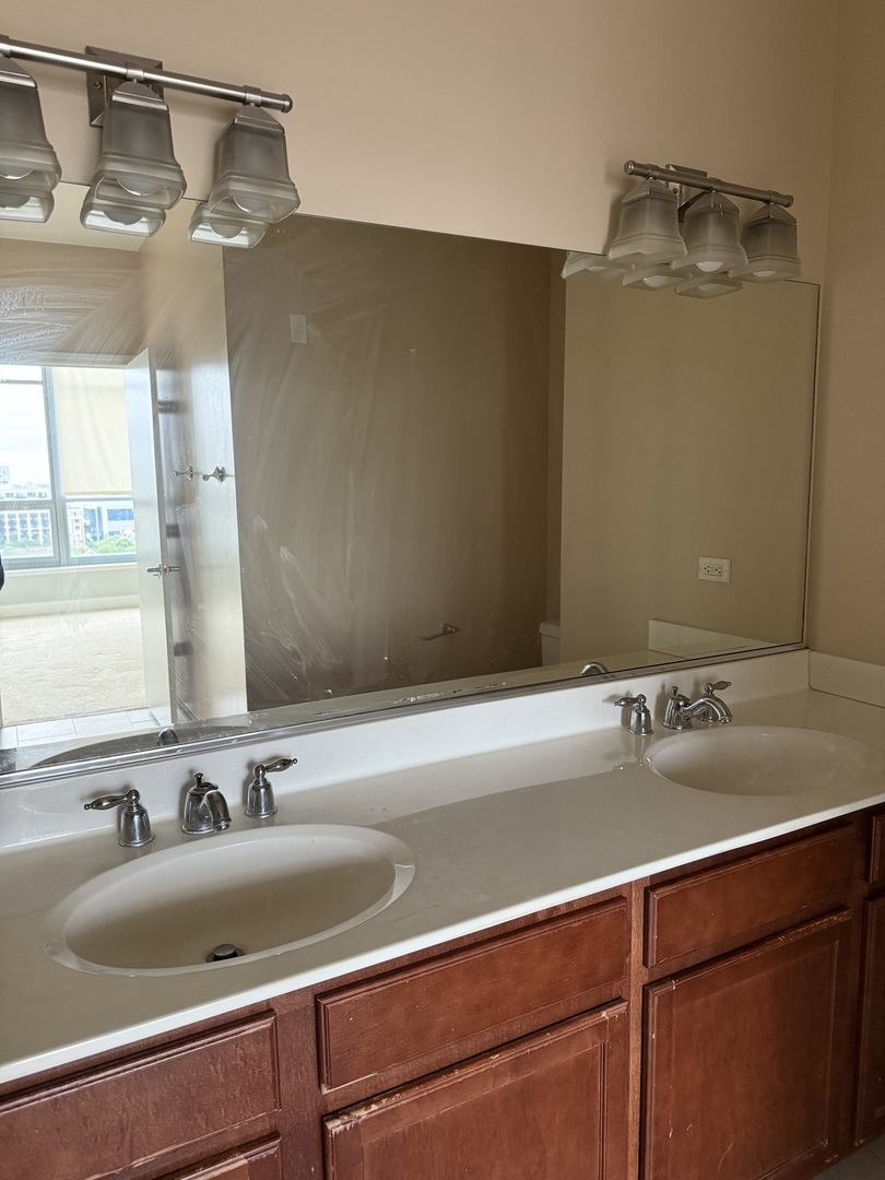 1600 South Prairie Avenue, Unit 1607 Chicago, IL 60616 - Photo 9 of 11 a close view of sink and tap