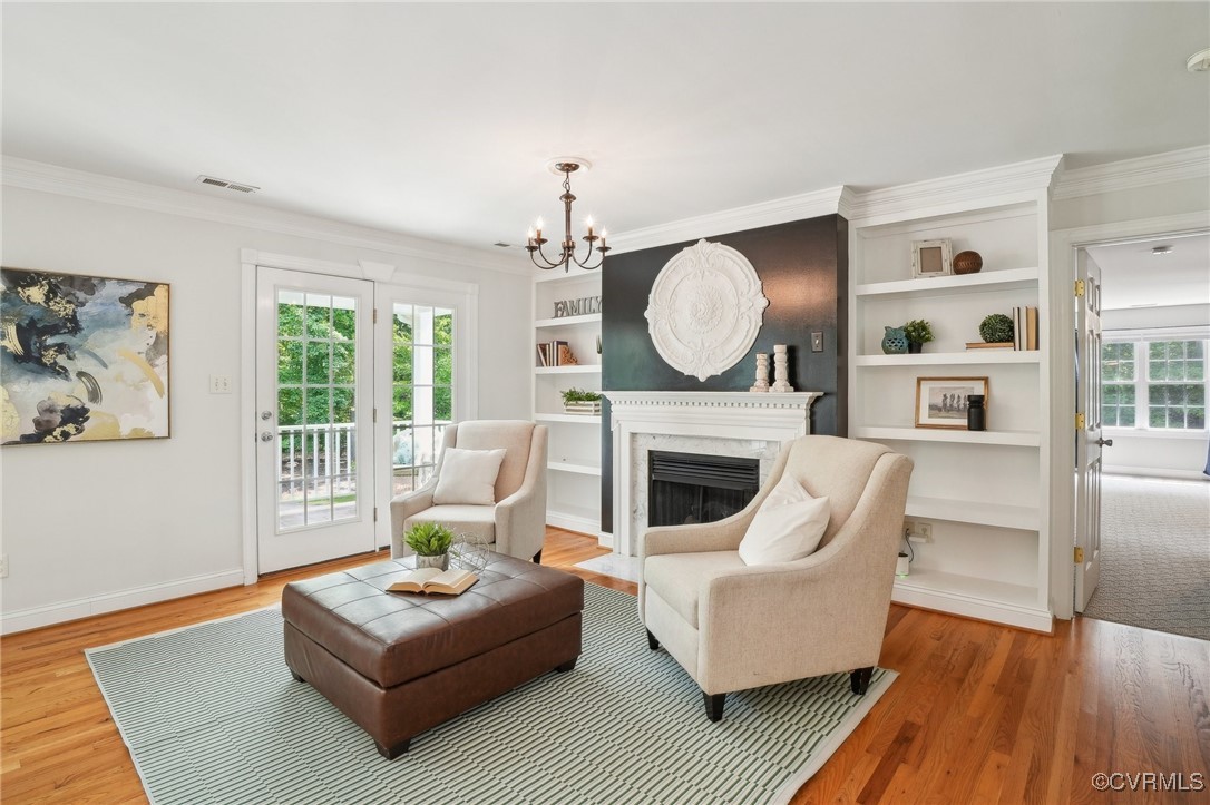 17501 Old Ridge Road Montpelier, VA 23192 - Photo 16 of 45 a living room with furniture a fireplace and a large window