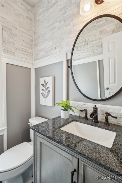 17501 Old Ridge Road Montpelier, VA 23192 - Photo 20 of 45 a bathroom with a granite countertop sink mirror vanity and toilet