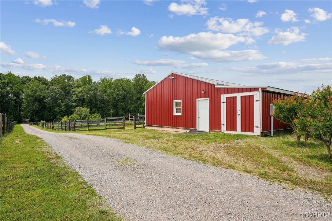 17501 Old Ridge Road Montpelier, VA 23192 - Photo 41 of 45 a view of a house with a yard and pathway