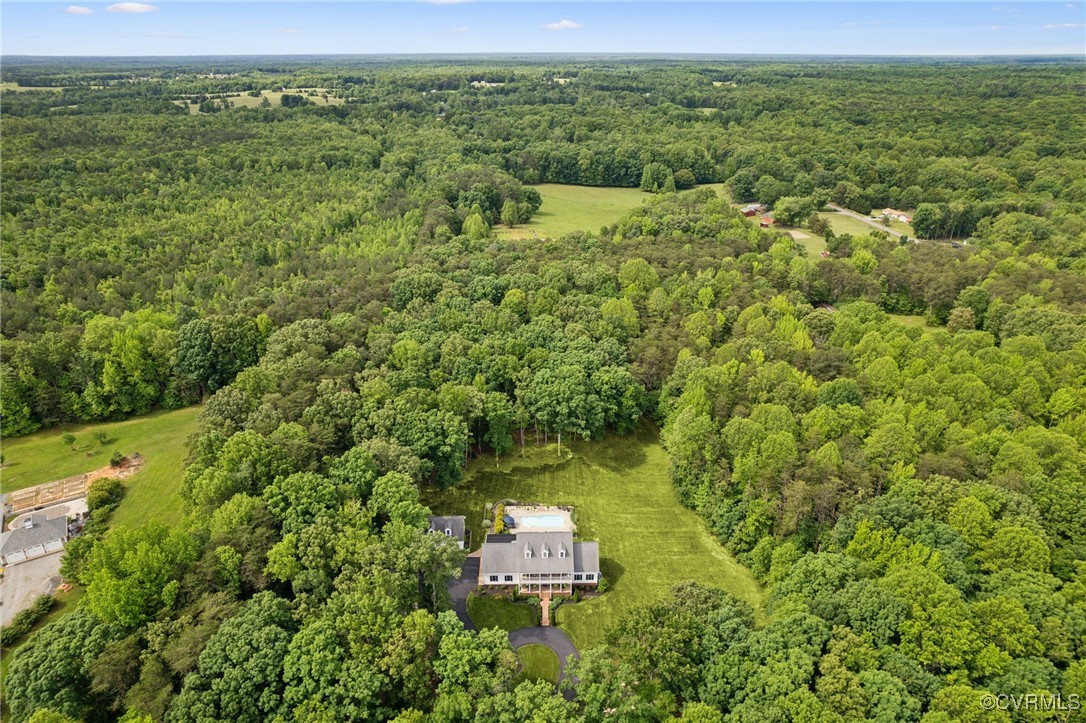 17501 Old Ridge Road Montpelier, VA 23192 - Photo 43 of 45 a view of a garden with a building in the background